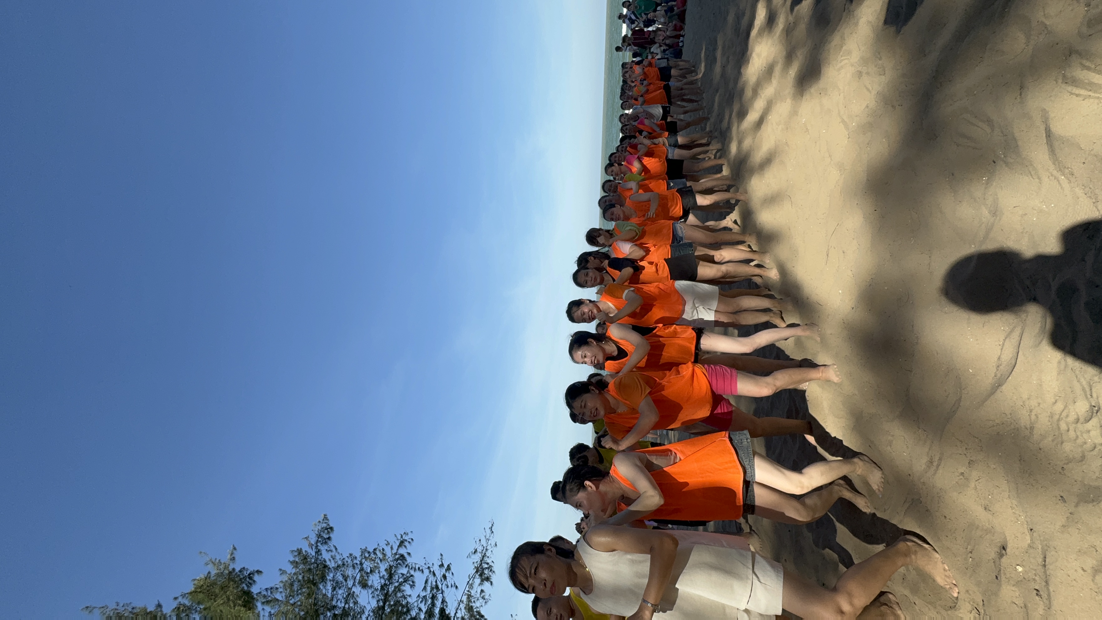 Team-building activities brought colleagues together through energetic beach challenges.